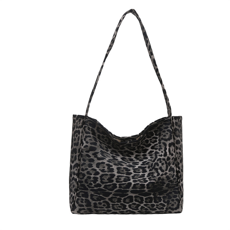 Otoño y invierno de Hong Kong viento de gran capacidad bolso de mano leopardo bolso de mujer bolso medioambiental ocio de moda universal bolso de hombro