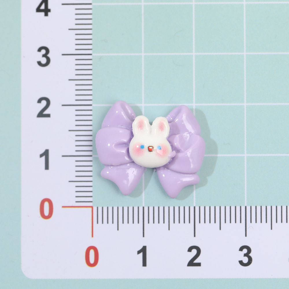Dibujos animados macaron mariposa conejo resina accesorios DIY crema pegamento horquilla accesorios para el cabello teléfono móvil Shell material hecho a mano al por mayor