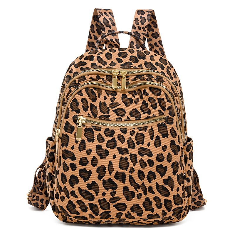 Mochila transfronteriza con estampado de leopardo súper fuego para mujer 2024 nuevo estilo salvaje para mujer mochila casual de gran capacidad bolso de viaje de moda