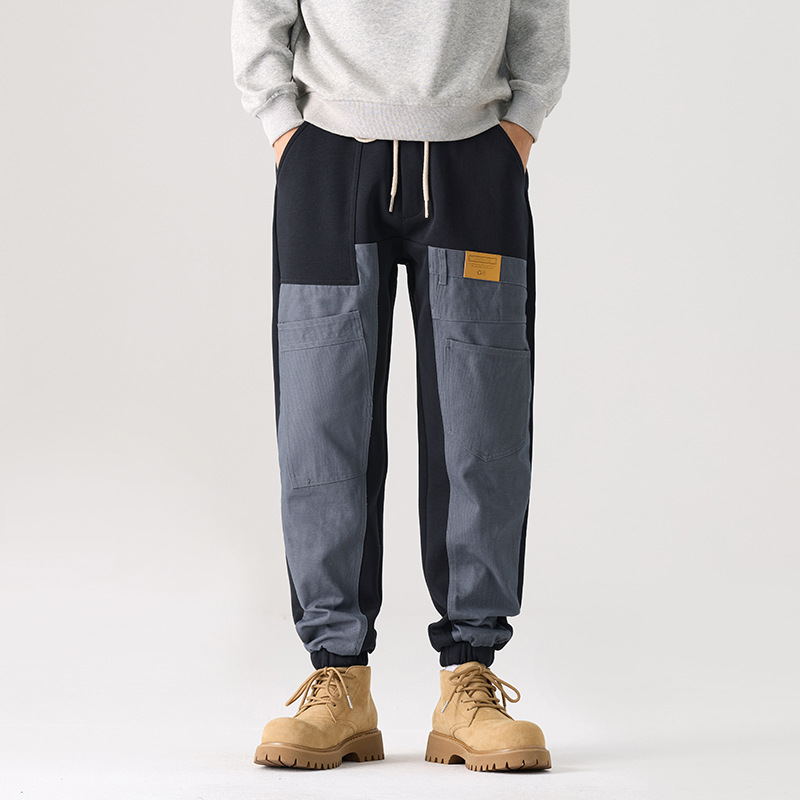 Mick Jones 2025, nuevos pantalones casuales de otoño, pantalones de guardia de hombre, pantalones grandes, pantalones de moda con etiquetas colgantes.