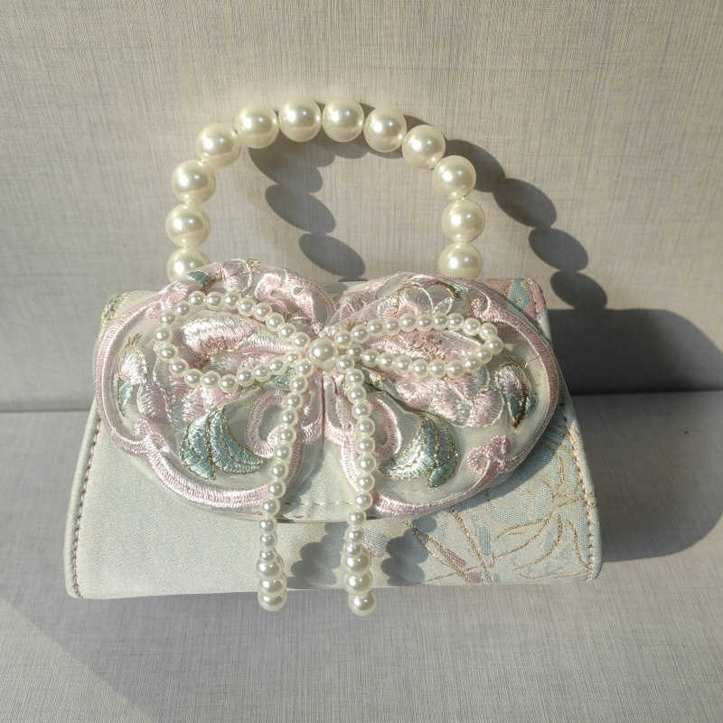 2025 primavera y verano estilo caliente moda casual niños dulces bolsa de gelatina mini bolso de mensajero de un solo hombro variedad al por mayor
