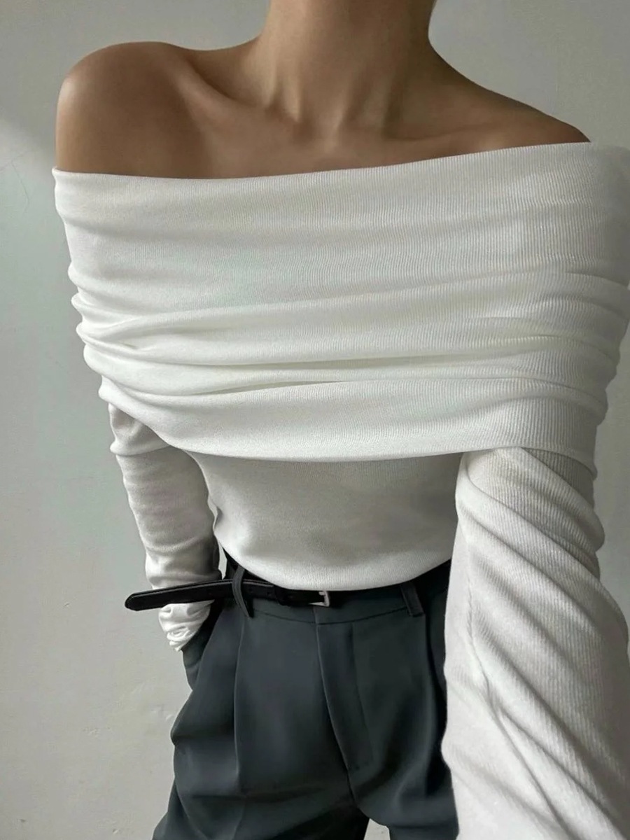 Cross-border 2026 nuevo estilo europeo y americano un hombro temperamento de diseño de hombro abierto sensación delgada envuelta en un suéter de punto de punto para mujeres