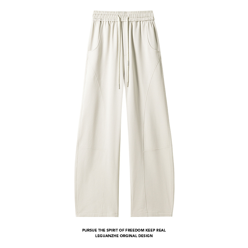 Schwarze Herren-Jogginghose mit diagonalem Schnitt und weitem Bein im sportlichen Herbst-Stil – Design im amerikanischen Retro-Stil_voghion.com
