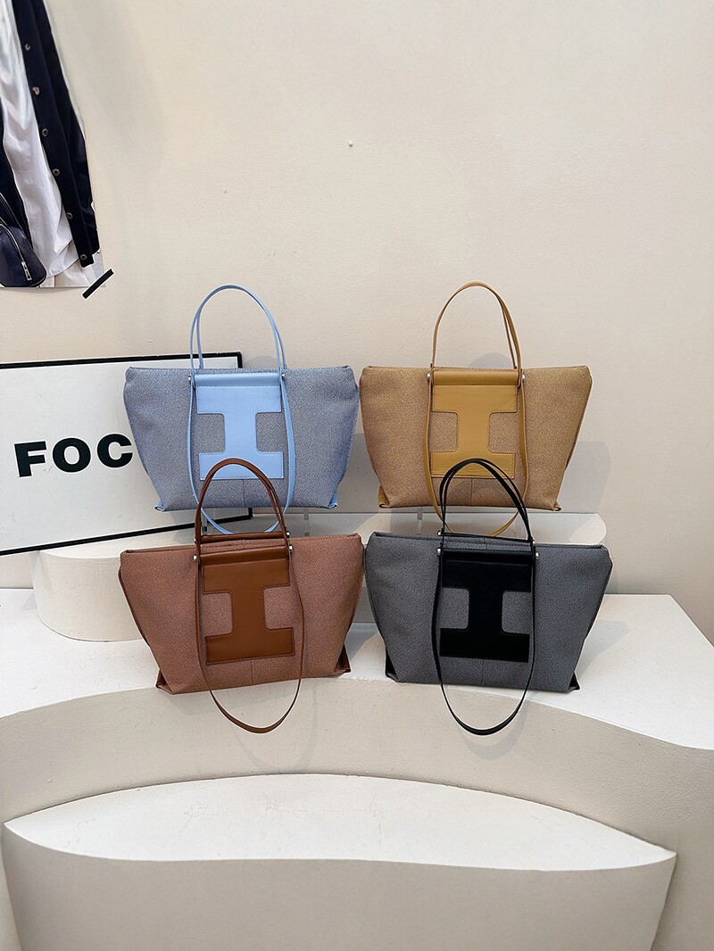 2026 nuevo bolso de hombro de viaje de gran capacidad de mujer bolso de moda versátil bolso de mano bolso de tendencia de diseño de color