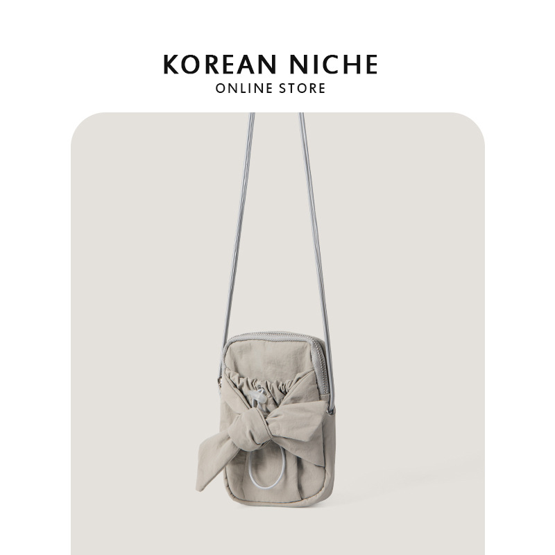 Bolso bandolera pequeño cuadrado de un solo hombro con lazo y diseño de nicho coreano nuevo 2024 para mujer con boca con cordón_voghion.com