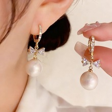 时尚网红人鱼姬耳环女2025新款东大门气质蝴蝶结珍珠小众耳扣批发