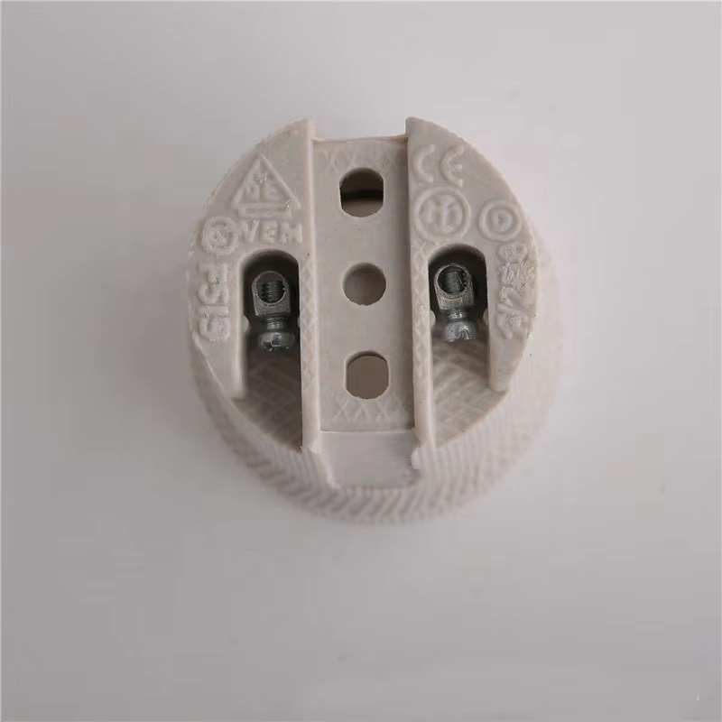 F519 E27 soporte de lámpara de cerámica resistente a altas temperaturas 250V 600W soporte de lámpara aislante grueso suministro directo de fabricantes