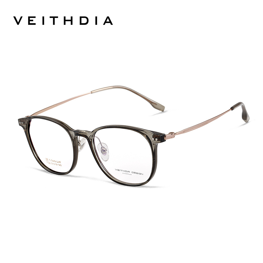 Pie de titanio puro marco de espejo de miopía óptica retro marco de ojo para hombres y mujeres puede estar equipado con grado al por mayor 7122