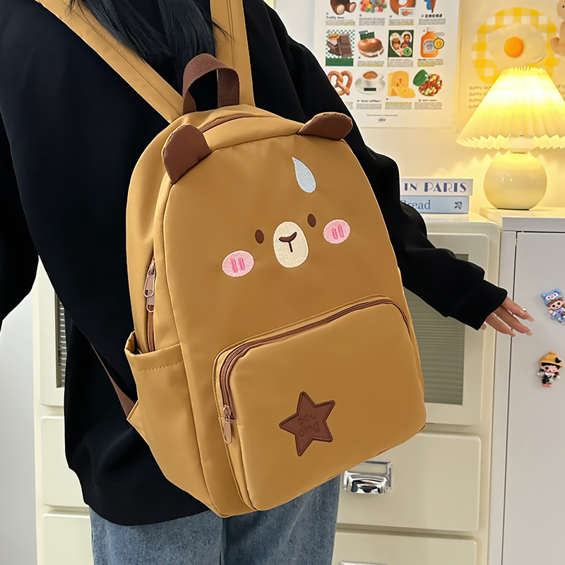 Cartoon cute little star mochila para mujeres nueva mochila de gran capacidad.