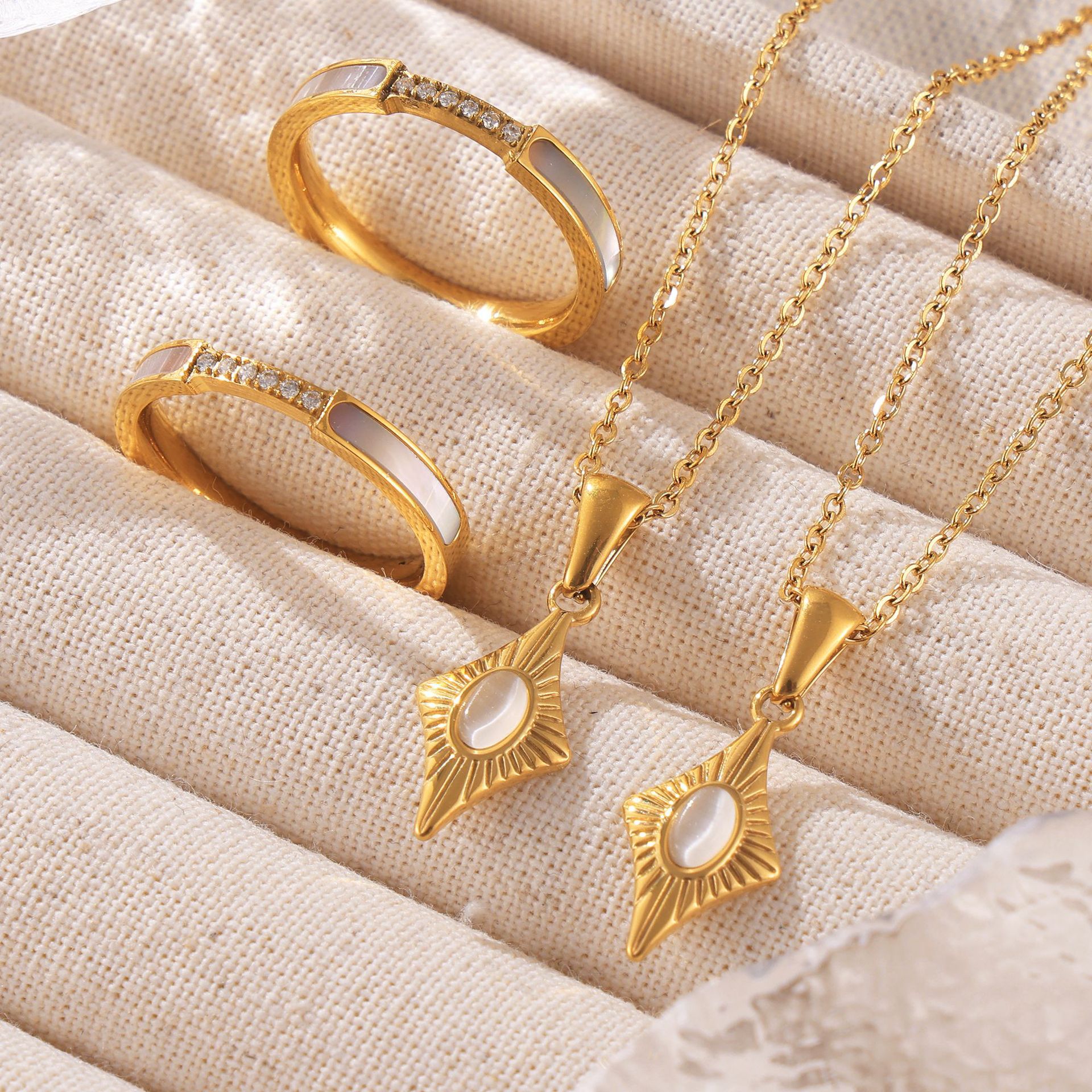 European And American Ins Style Four Star Cat Eye Stone Pendant Titanium Steel Lock Chain Sea Shell Ring Necklace Ring Niche Set_voghion.com