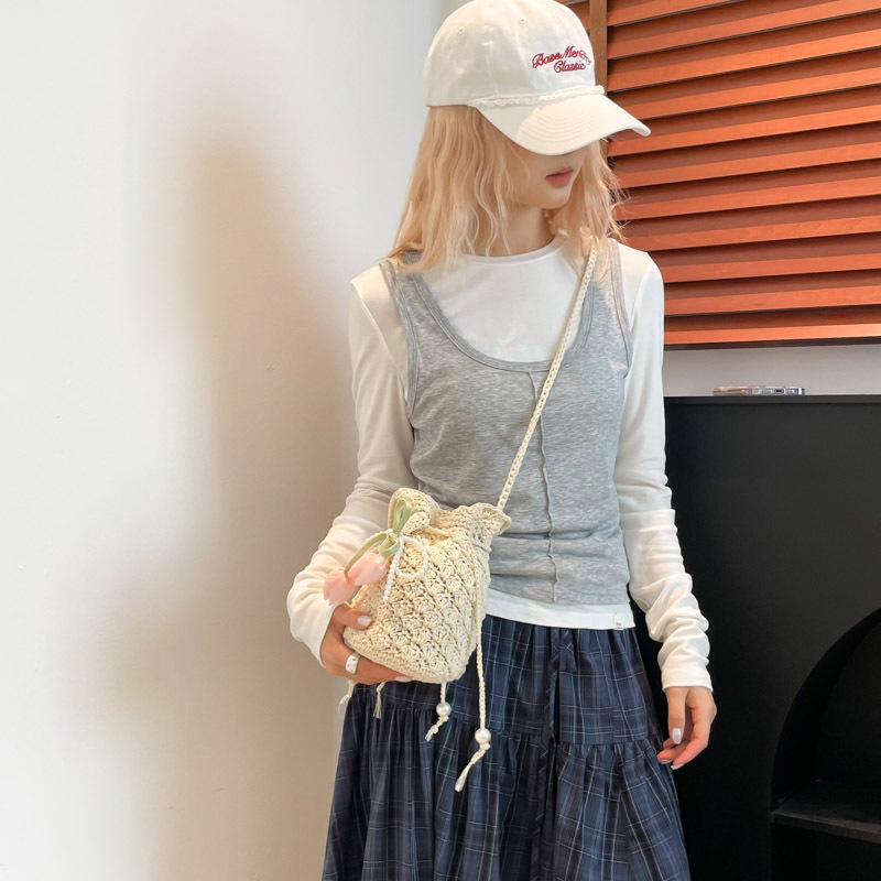 Versión coreana del bolso de cubo de nicho 2025 verano nuevo bolso femenino pequeño bolso de hombro de flores frescas bolso de mensajero tejido Mori