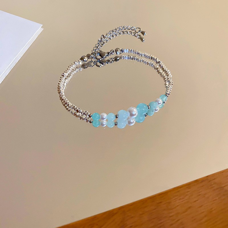 Pulsera de plata rota de perlas de circón de lujo ligero francés, pulsera simple de nicho, pulsera de todo fósforo, joyería de alta gama femenina de verano