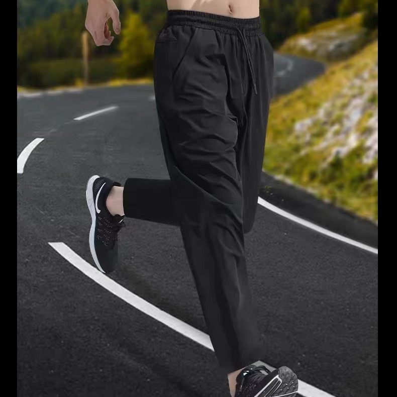 Pantalones deportivos para hombres entrenamiento de acondicionamiento físico hielo de verano delgado rápido secado ocio piezos de corrección deportiva pantalones de tejido