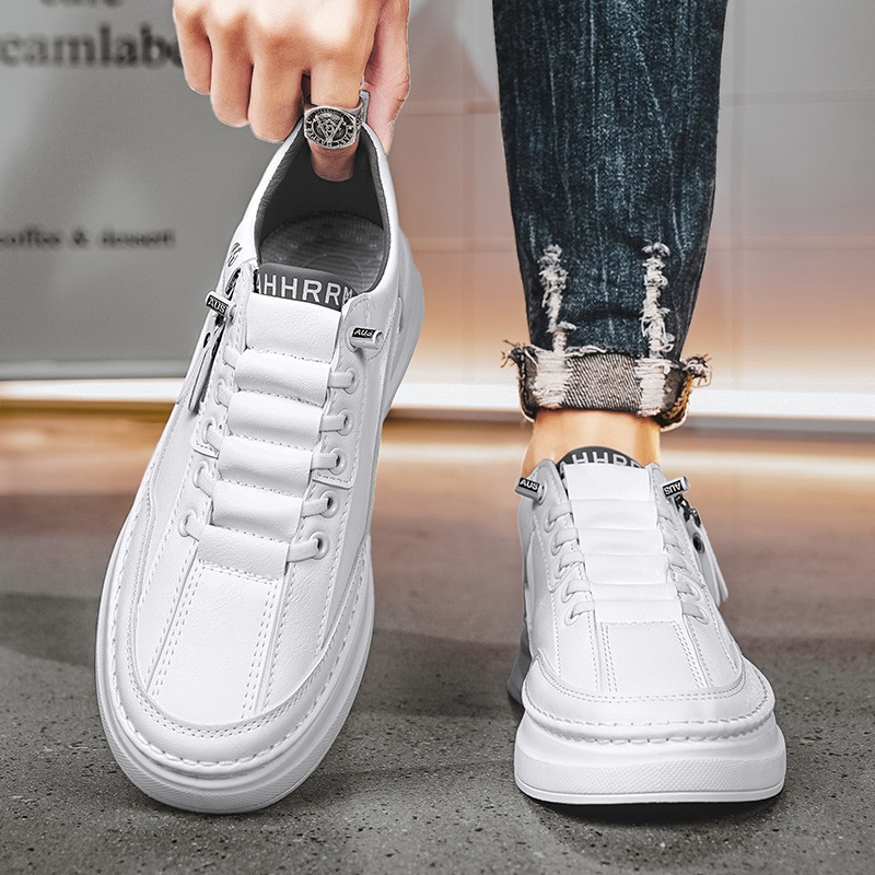 Zapatos de skate para hombres zapatos blancos bajos estudiantes 2025 nuevos zapatos de cuero casuales de primavera para hombres zapatos de moda con cremallera para adolescentes