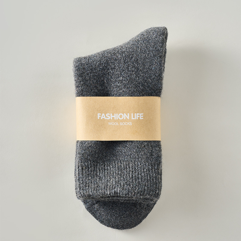 Calcetines de lana otoño e invierno más calcetines de mujer engrosados de terciopelo para hombres Calcetines cálidos de felpa de color sólido Calcetines de tubo medio para mujer de nieve