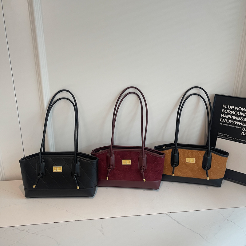 Bolsa de mano transfronteriza de alto nivel, bolso de celosía casual para mujeres, otoño y invierno 2025, nueva bolsa de hombro casual de gran capacidad.