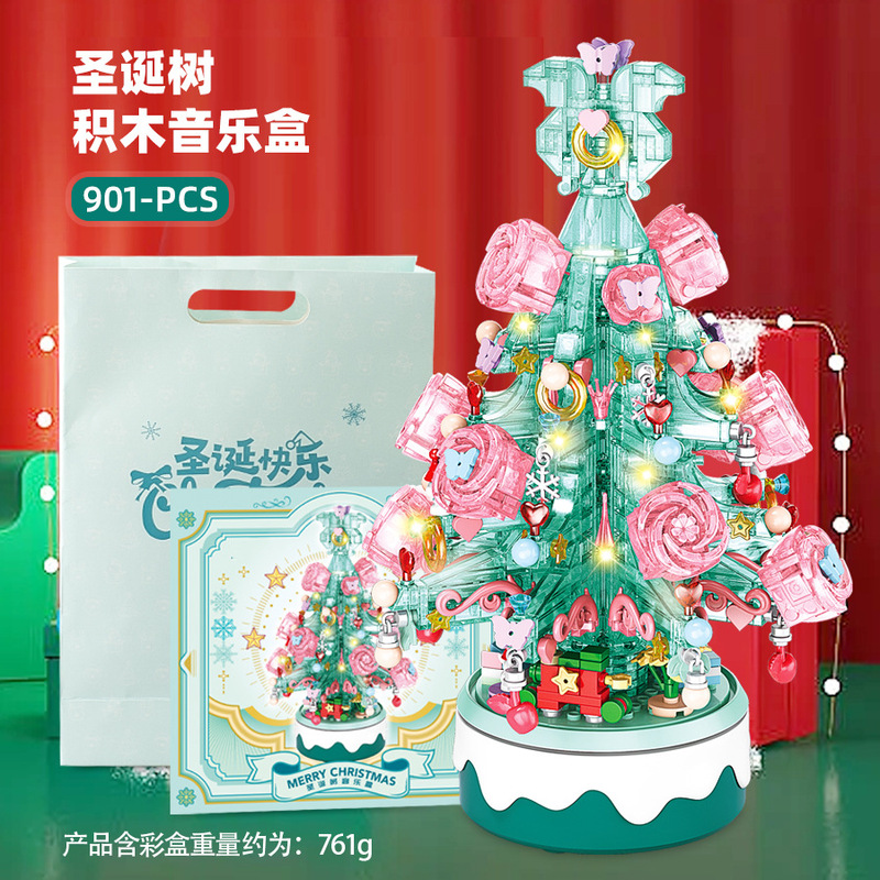 子供のクリスマスツリーの照明のオルゴールの小さい粒子の益智は積み木のおもちゃのクリスマスを詰めてアイデアの贈り物を並べます。|undefined