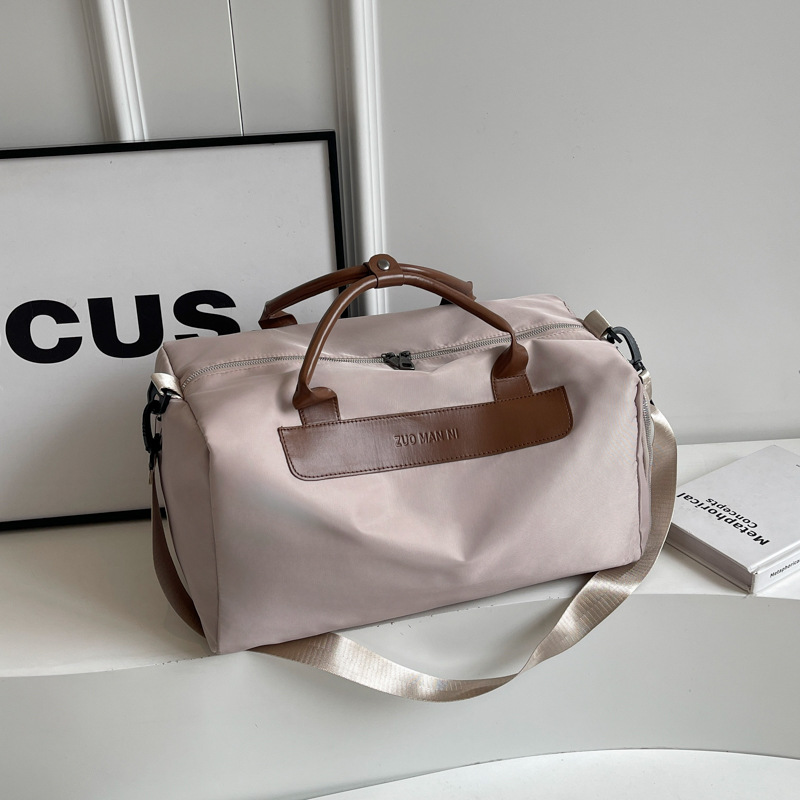 Nueva bolsa de viaje ligera y simple de gran capacidad portátil bolsa de ropa de cama inclinada bolsa deportiva de ocio para mujeres bolsa de ejercicios para hombres