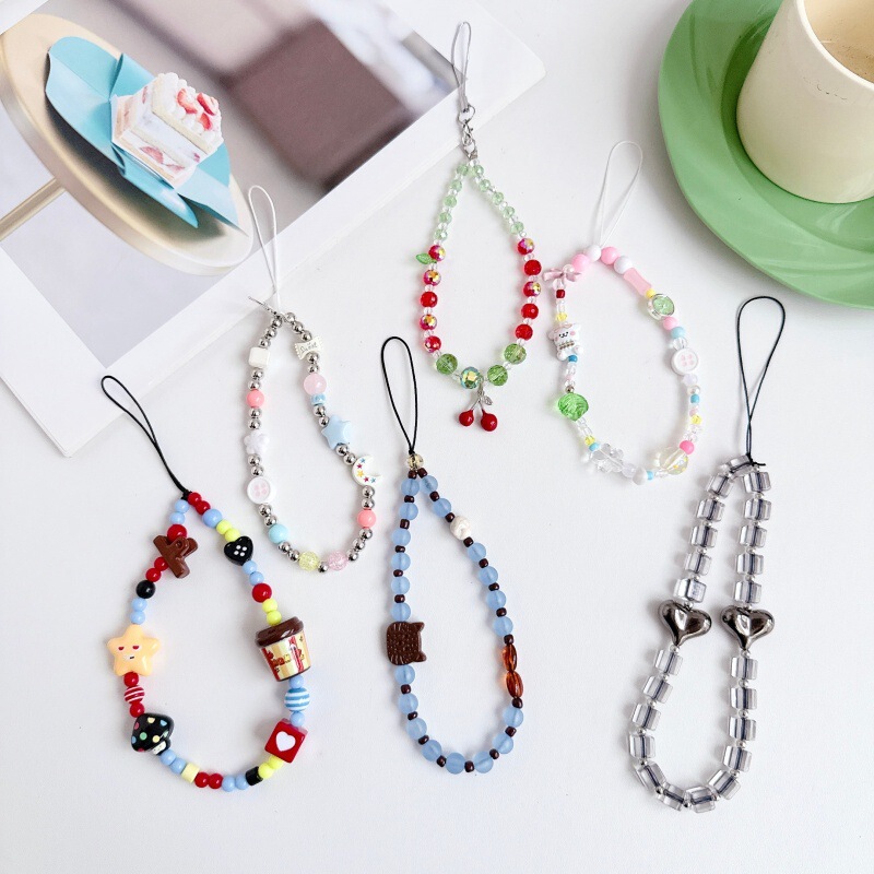 Dopamine-style mixed crystal beaded phone chain with cherry pendant and rainbow beads, creative new design Dopamine-style mixed crystal beaded phone chain with cherry pendant and rainbow beads, creative new design