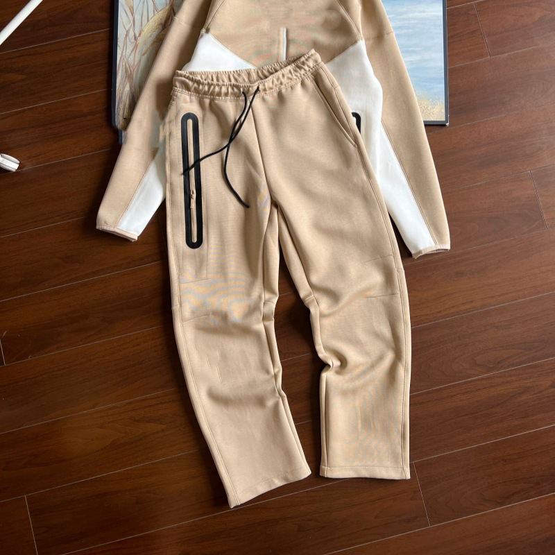 24 años de primavera y otoño para hombres nuevos pantalones de impresión rectos sueltos pantalones casuales de moda pantalones deportivos grandes pantalones de empalme