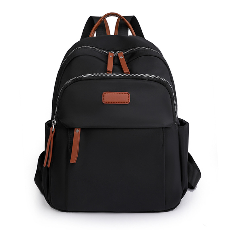 Bolsos para mujer 2023 nueva mochila casual para mujer de nailon moda todo fósforo color de contraste mochila ligera mochila escolar al por mayor