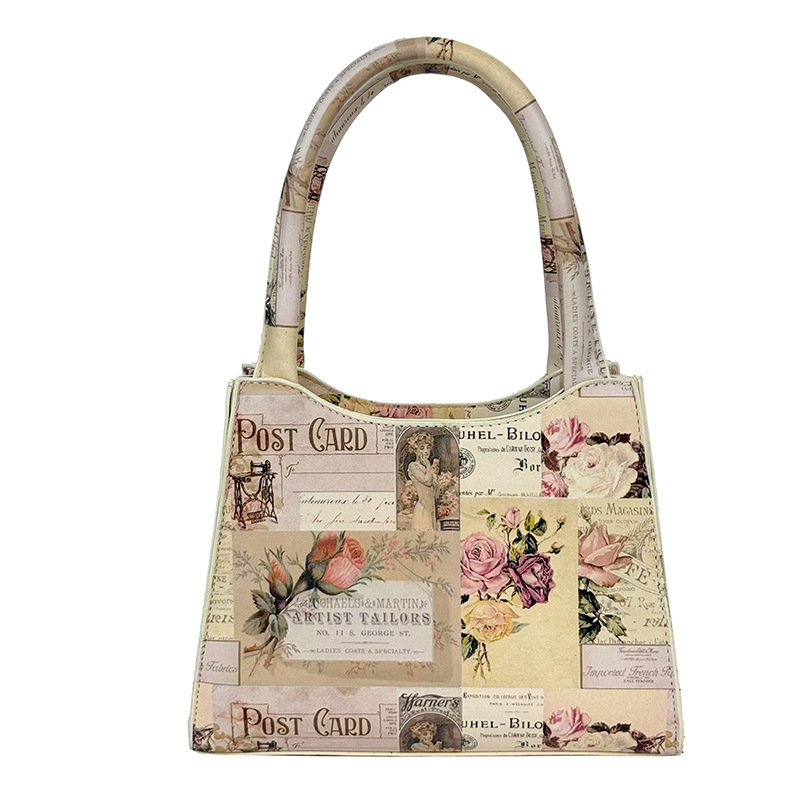 Bolso de moda europeo y americano 2025 verano nuevo bolso femenino cartel retro bolso de hombro cadena de personalidad bolso de mensajero marea