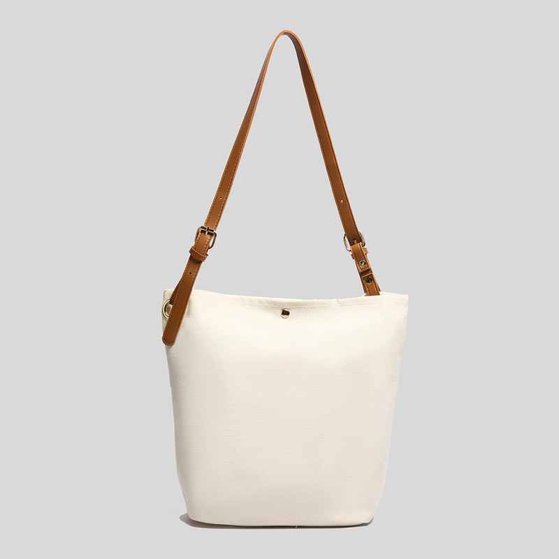 New Large Capacity Bucket Bag Simple Fashionable Canvas Women's Bag Niche with Leather Design Shoulder Crossbody Bag