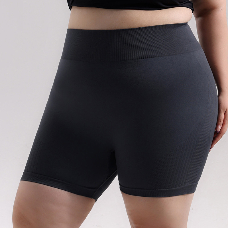 Pantalones cortos de cadera de melocotón deportivos sin costuras de gran tamaño europeos y americanos