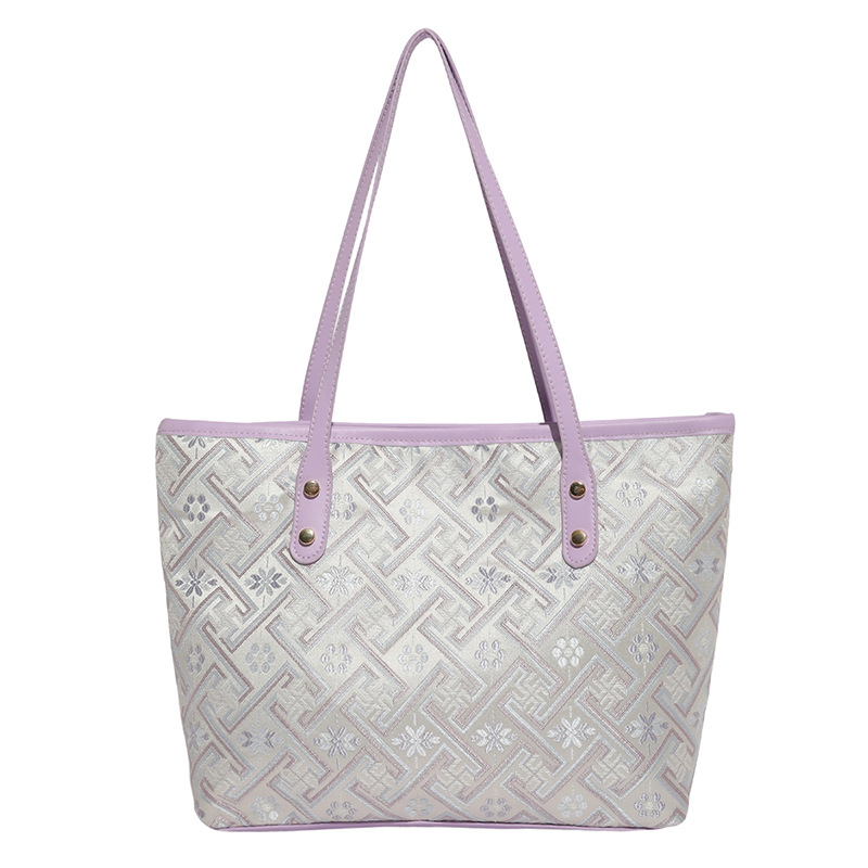 2025 nuevo estilo nacional de diseño de patrón oscuro bolso de mujer gran capacidad versátil bolso de viaje bolso de hombro de moda ligero de lujo