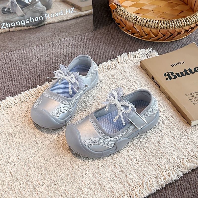 Sandálias de arco para niñas 2026 verano nuevo estilo de niños princesa de viento suave anti-deslizante zapatos de playa huecos zapatos de Lefour