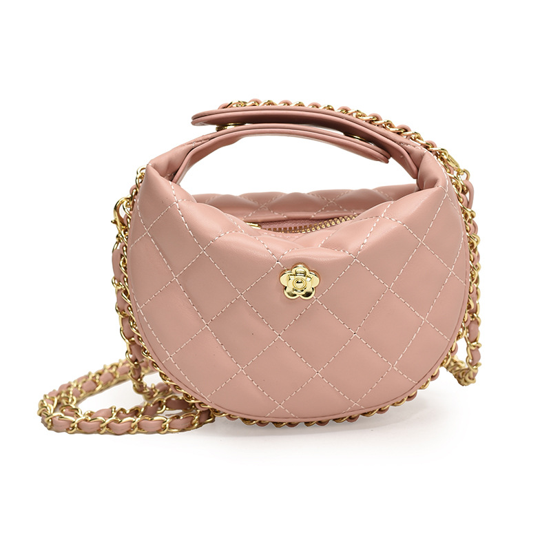 El popular bolso para niños mini camelia de este año 2024 nuevo bolso de cadena de diamante de textura de estilo nuevo bolso de niña de cambio de mensajero
