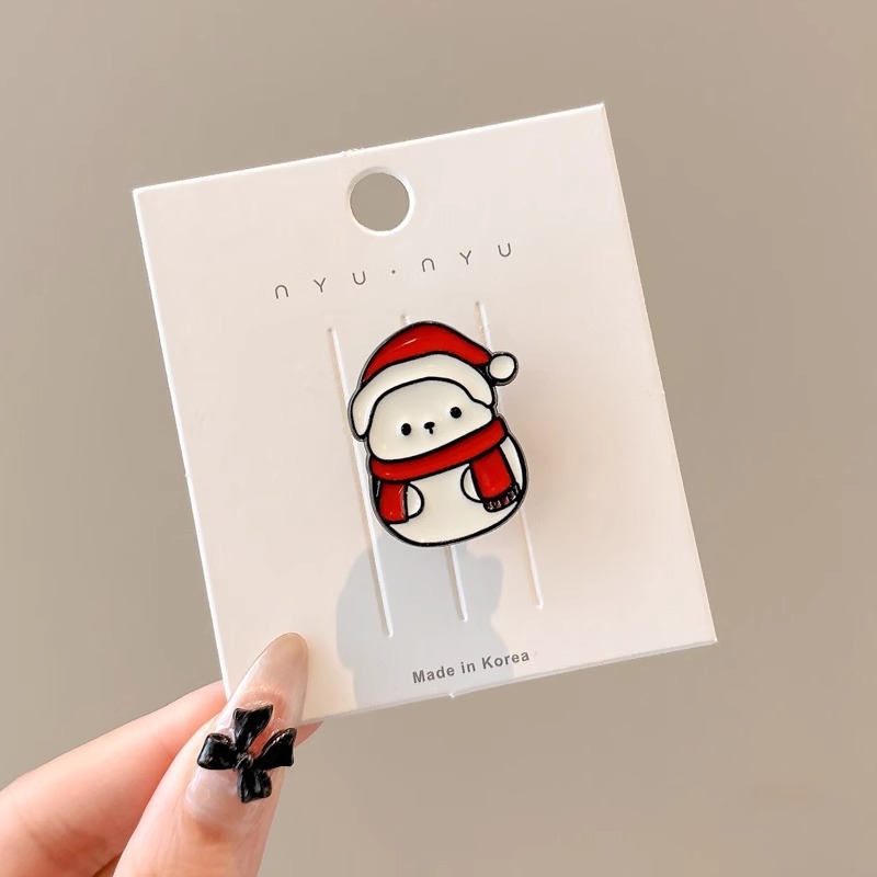 Broche de aleación de sentido avanzado japonés nueva insignia de personalidad de moda femenina de dibujos animados bolsa de Navidad accesorios de metal al por mayor