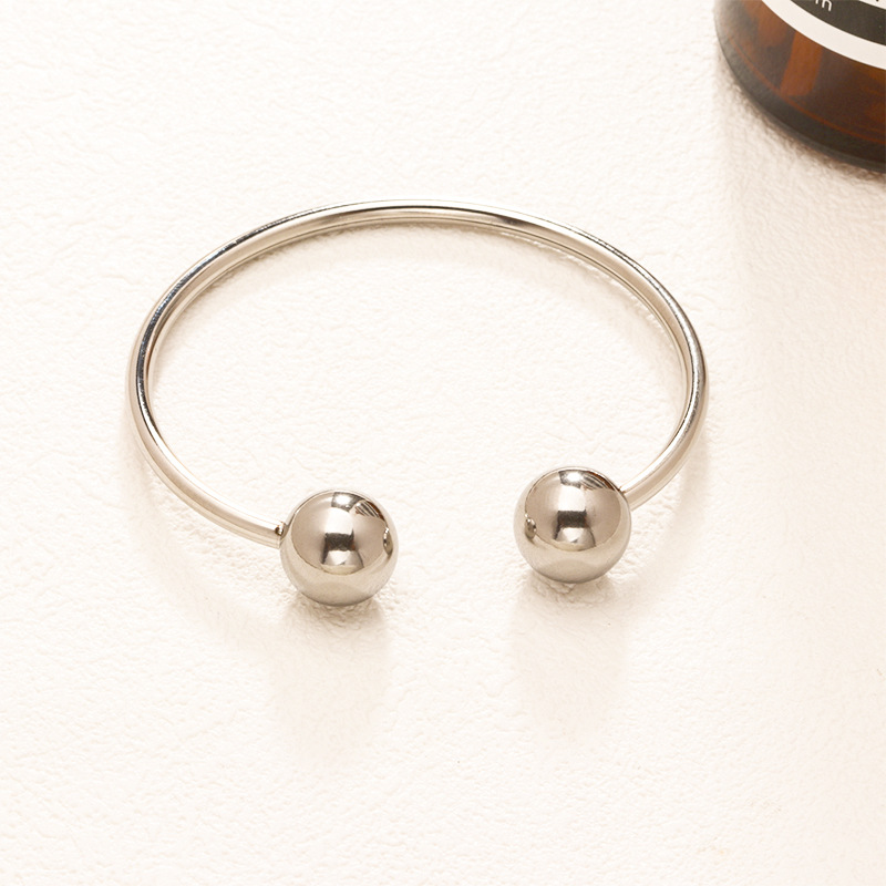 Fábrica en stock al por mayor de Europa y América transfronteriza de acero inoxidable en forma de C pulsera abierta ajustable chapado en oro 18K personalidad no se desvanece