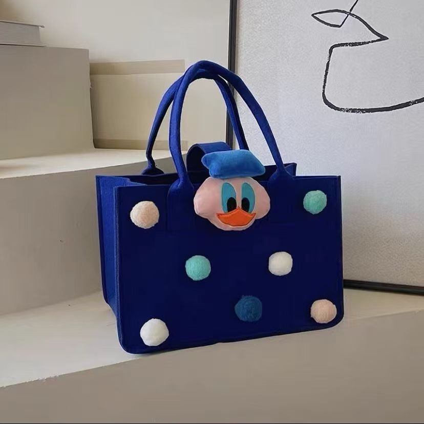 Fabricantes al por mayor en línea sobre rojo bolso de fieltro bolso de mano regalo de dibujos animados bolso de fieltro promoción de apertura bolso de regalo almacenamiento