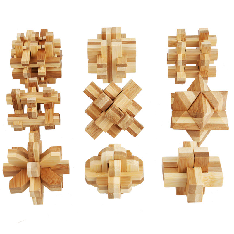 Suministro directo de fábrica para niños rompecabezas de desbloqueo Kong Ming traje de bloqueo de bambú Luban bloqueo traje de inteligencia juguetes al por mayor