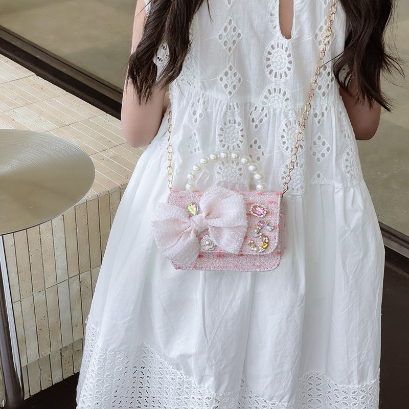 Bolso de cinturón para niños bolso de cambio pequeño viento perla de moda bolso de arco bolso de niña linda
