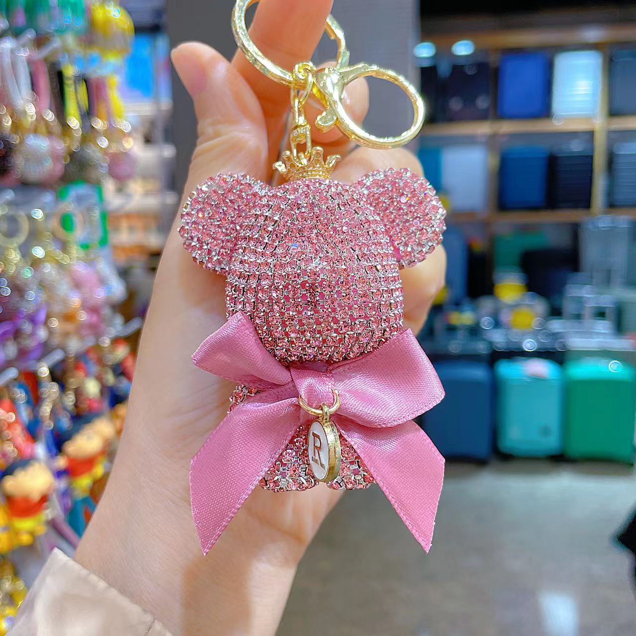 Venta directa de fábrica de lujo completo diamante muñeca llavero pajarita cabeza grande oso completo diamante bolsa colgante coche llavero