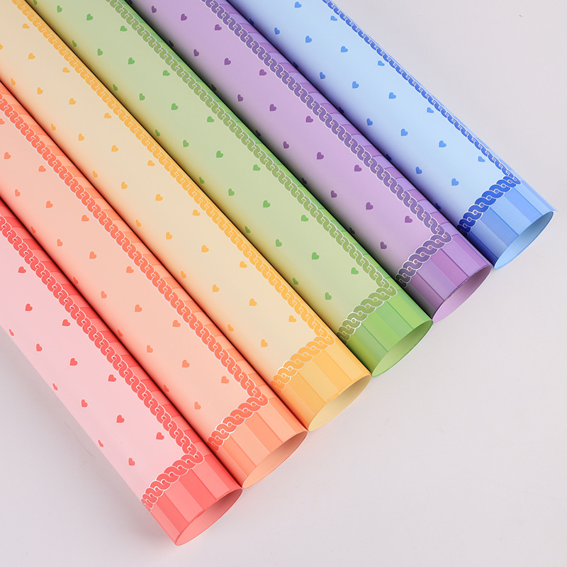 跨境外贸专供公主裙鲜花包装纸加厚防水珠光膜花艺包花纸整箱批发