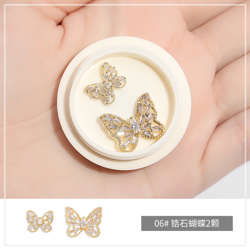 Online popular hielo transparente Aurora mariposa joyería cristal blanco piedra tridimensional uñas diamante Super Flash rhinestone uñas joyería