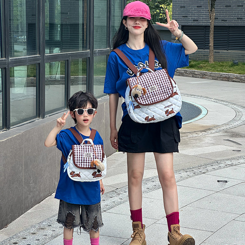 Escuela de jardín de infantes Escuela de escuela primaria Mochila de dibujos animados lindo cachorro para padres e hijos 2025 Nuevo estilo con colgante Mochila para niños