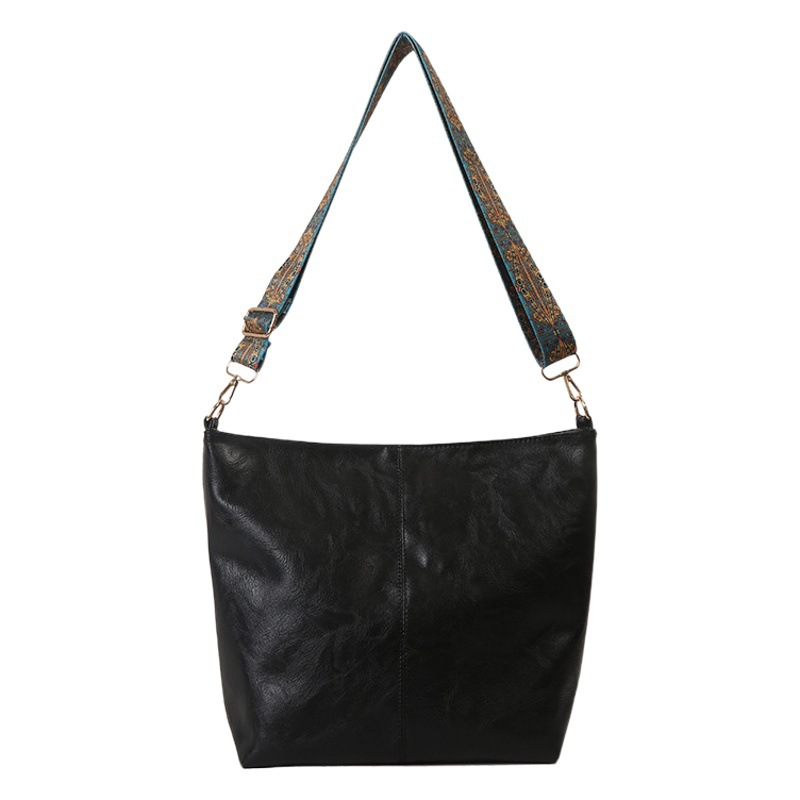 Bolso ancho de la correa de hombro de gran capacidad de cuero suave retro de moda de este año para las mujeres 2023 Otoño e Invierno Nuevo bolso de mensajero de moda