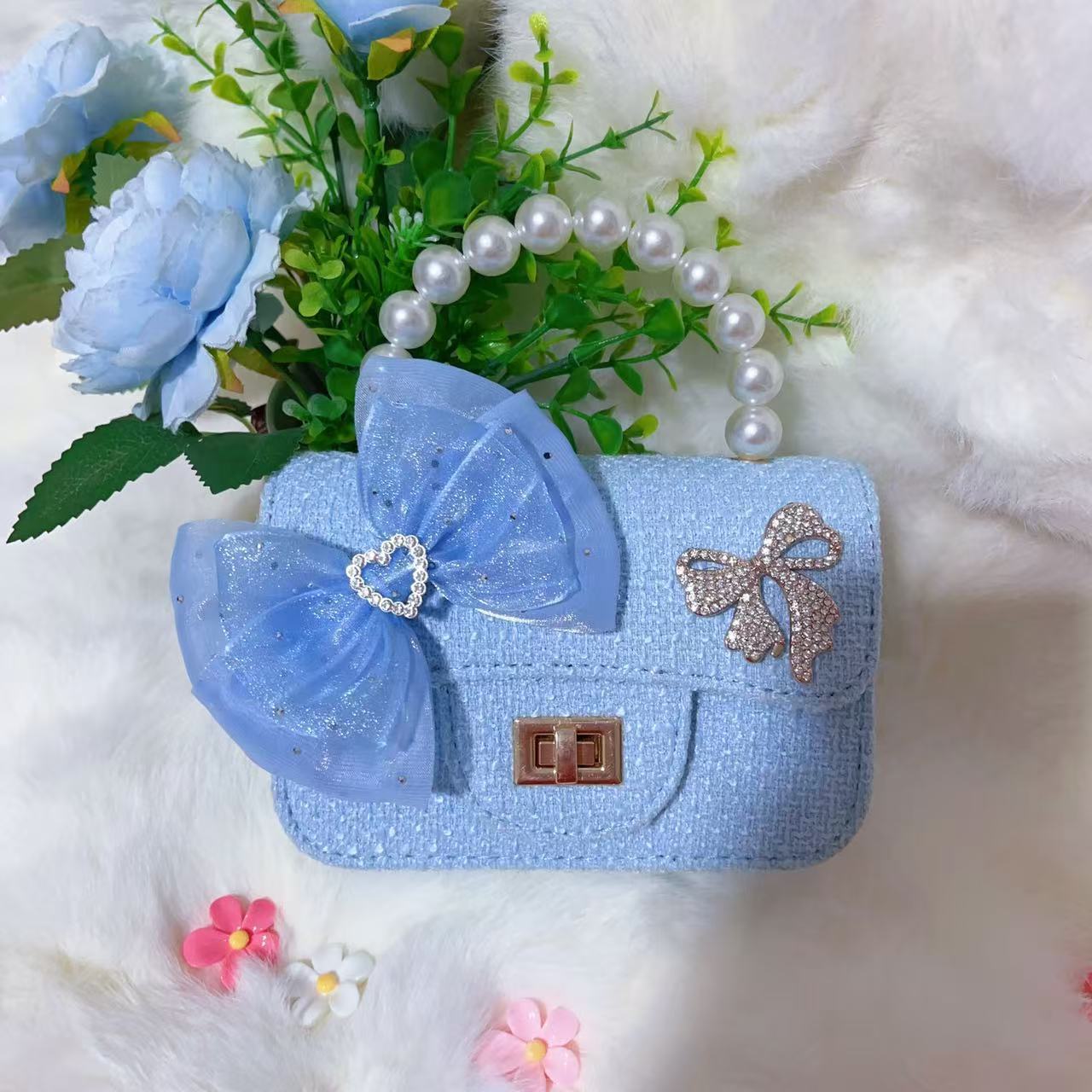 Nuevo tipo de bolsos para niños, bolsos de moda, bolsos de princesa de viento, bolsos portátiles lindos para chicas, bolsos de red para bebés.