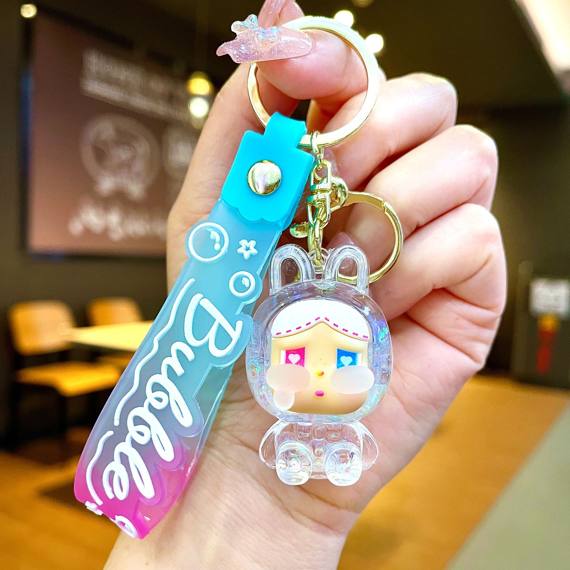 Llavero red acrílico con arena flotante