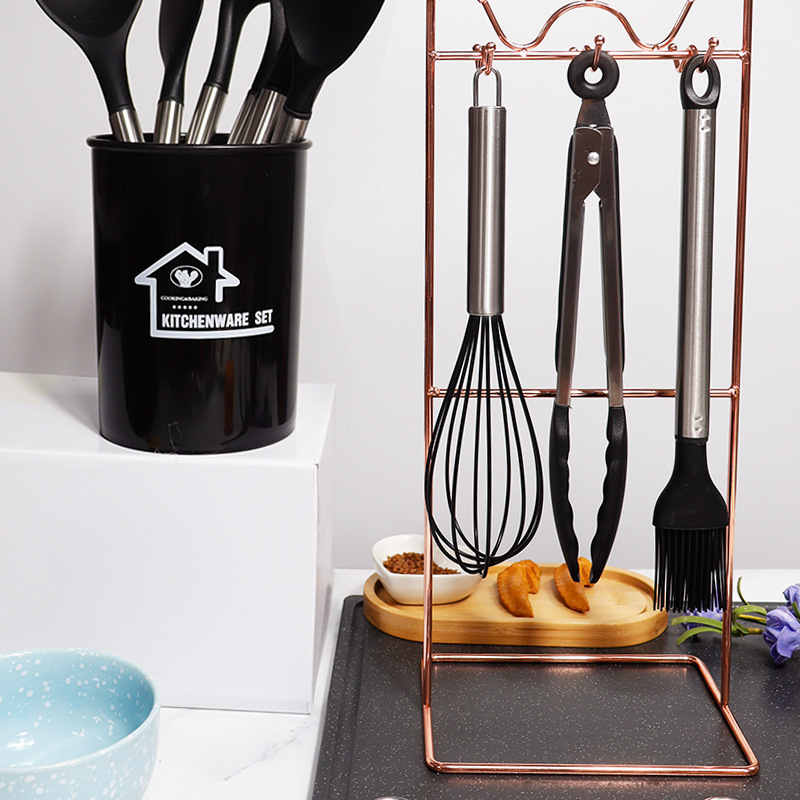 Cuchara de sopa de espátula de silicona transfronteriza Juego de 23 piezas de sartén antiadherente Pala de silicona especial Juego de utensilios de cocina de silicona de grado alimenticio al por mayor