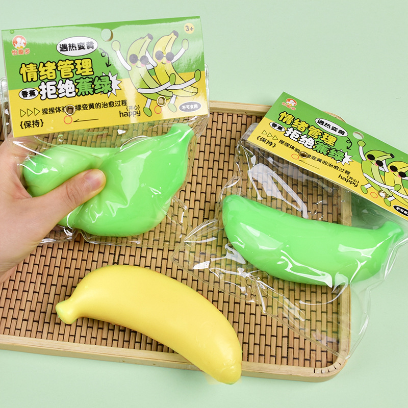 Banana de color cambiante pellizco juguete de música de ventilación rojo de la misma oficina descompresión rebote lento artefacto creativo al por mayor