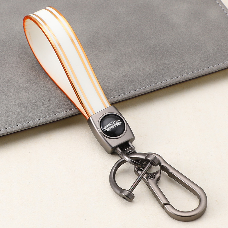 Cuerda de mano de silicona transfronteriza llavero de coche logotipo de coche apellido llavero anti-pérdida llavero de cuerda de mano de silicona duradera