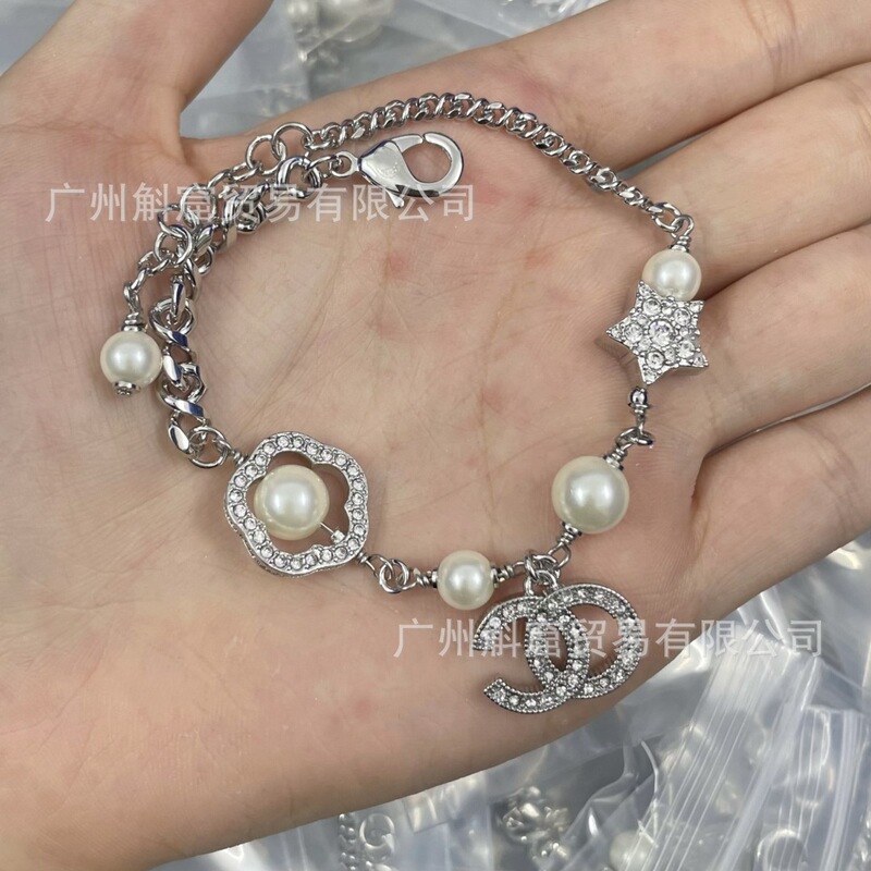 Factory real shot: Chanel double C camellia pearl bracelet for women, Chanel full diamond floral bracelet for women, wholesale and dropshipping Factory real shot: Chanel double C camellia pearl bracelet for women, Chanel full diamond floral bracelet for women, wholesale and dropshipping