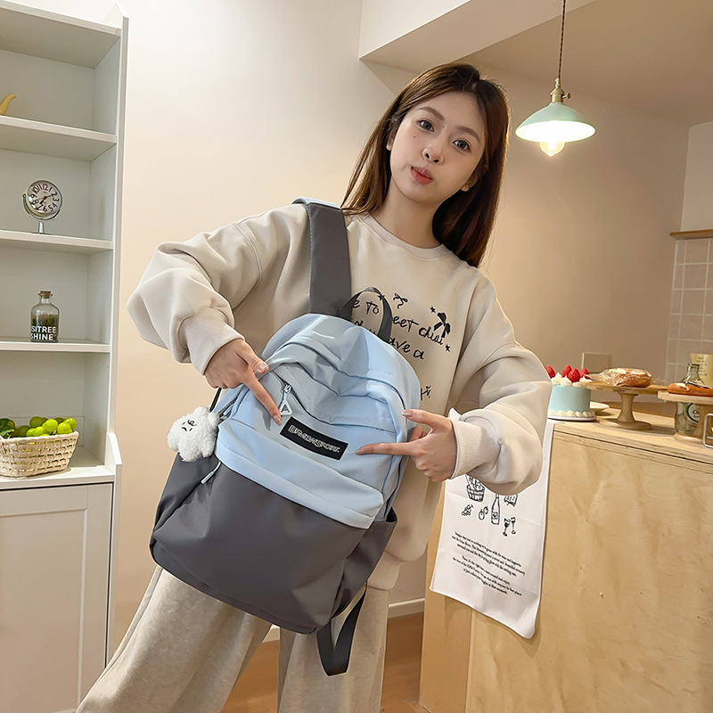 Nuevo paquete de dolor lindo de gran capacidad 2025 empalme de color de moda y viaje de ocio con 100 pares de hombros de alto valor facial inicial