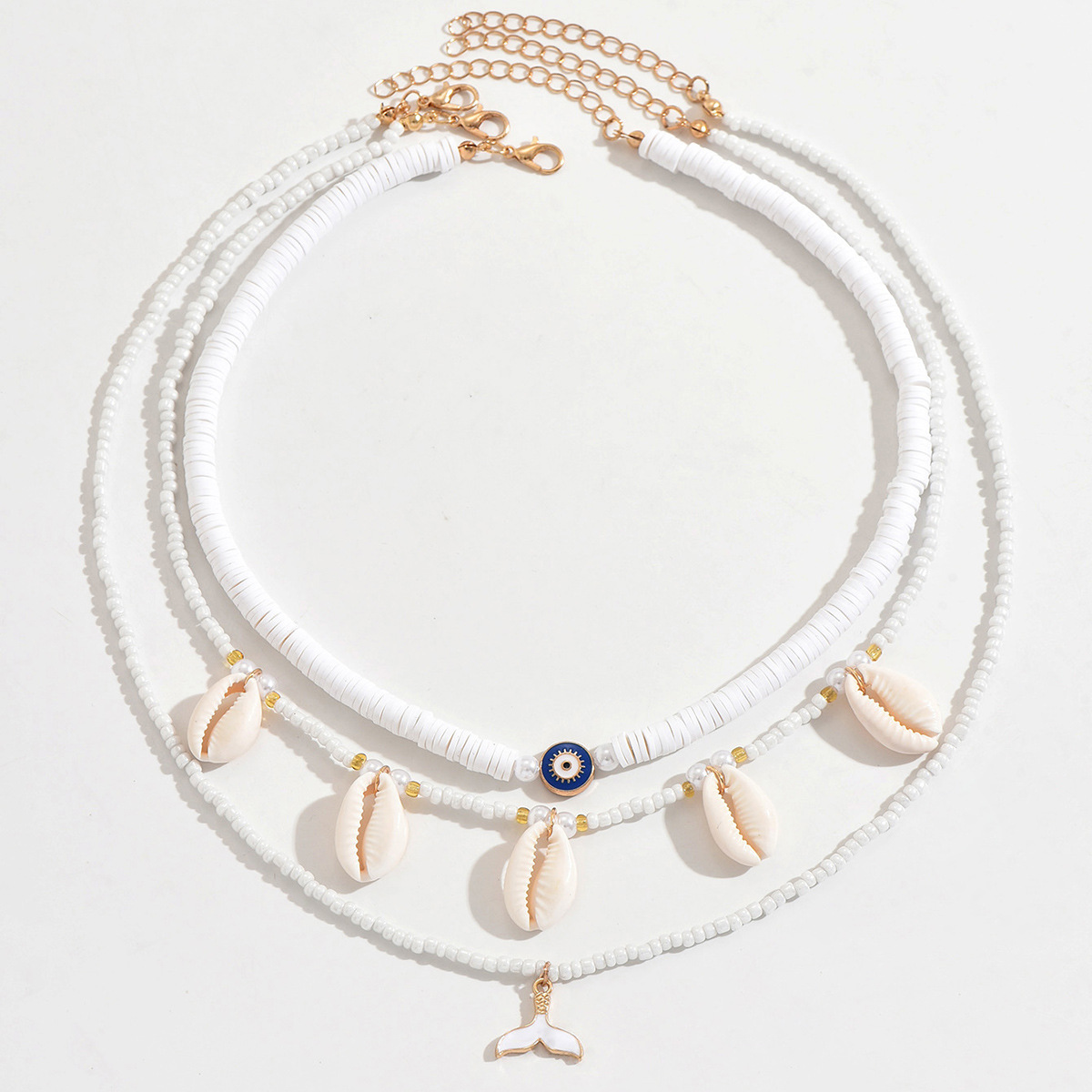 Colar em camadas estilo boho com pingente de coração e concha_voghion.com
