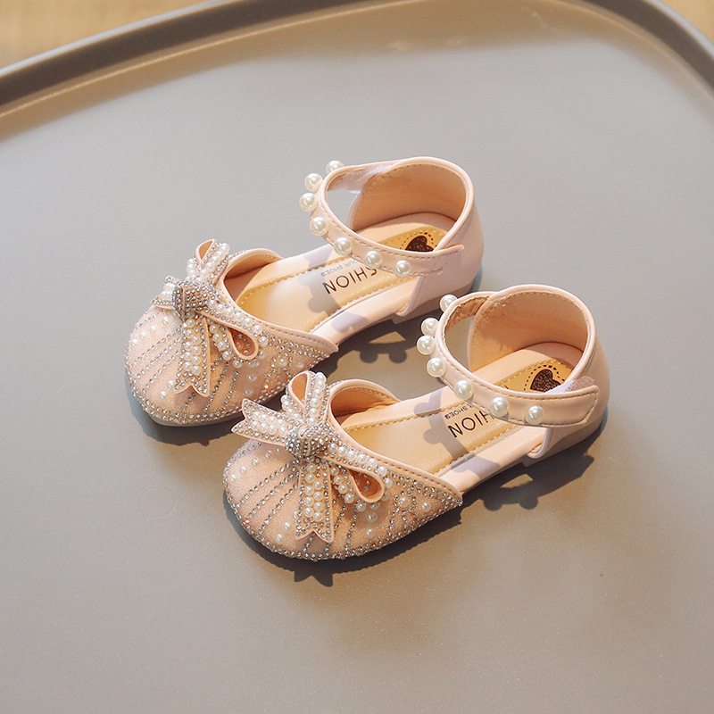 Zapatos de cristal para niñas 2026 verano nuevas sandalias de cabeza de bolsillo para niños pequeños zapatos de princesa suaves zapatos de baile de niñas